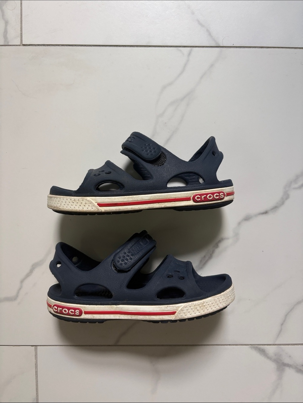 CROCS Kids Navy Blue Sandal-Style Clogs with Red & White Sole Stripes